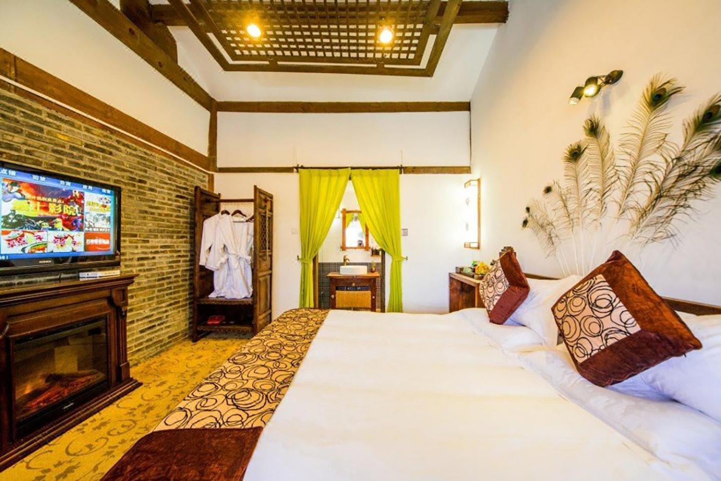 Big Tree Guesthouse - Naxi Old Style ليجيانغ المظهر الخارجي الصورة